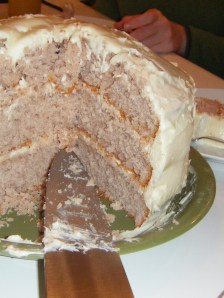 unclear why I'm holding the cake at knifepoint